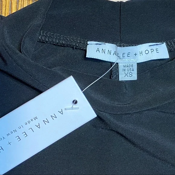 Annalee & Hope Embellished Hemline Sleeveless Black Dress
Size XS - Picture 8 of 15